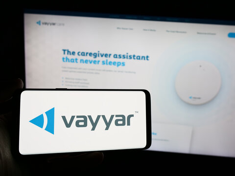 Stuttgart, Germany - 03-27-2024: Person holding smartphone with logo of Israeli semiconductor company Vayyar Imaging Ltd. in front of website. Focus on phone display.
