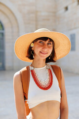 portrait of a young girl in a hat and beads. Fashionable accessories. - 776954739
