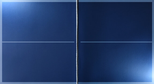 Top view of blue ping pong playing surface