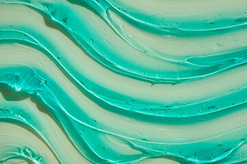 Liquid gel or serum on a screen of microscope blue green  reflected background smudge