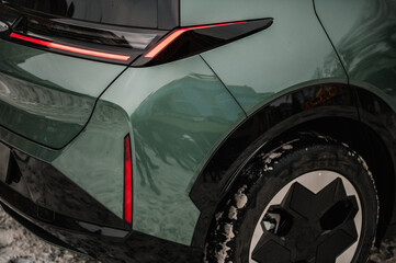 Right rear tail light on new modern electric sedan car. Modern supercar exterior design detail...