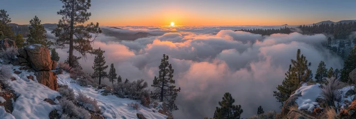 Rolgordijnen Sun setting behind clouds in mountain landscape © Viktor