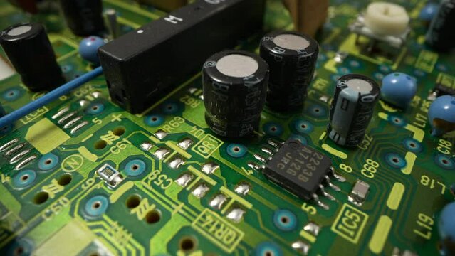 Electronic circuit board production. Automated Circut Board machine Produces Printed digital electronic board. Electronics contract manufacturing. Manufacture of electronic chips. High-tech