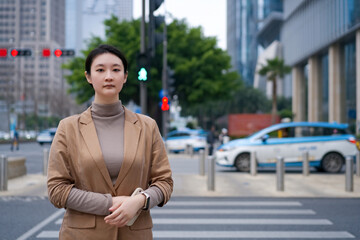 Confident Professional Woman in Urban Setting