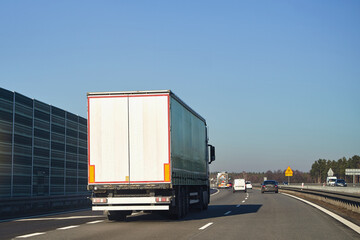 Fast and reliable semi-trucks transporting goods on road