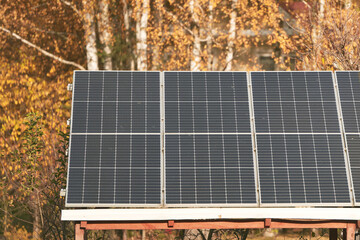 A Photovoltaic Roof for a Sustainable House. The House uses Solar Panels to Produce Electricity and Protect the Environment from Fossil Fuels.