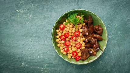 Buddha bowl with chickpeas, meat and chili pepper, oriental food