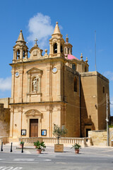 Fototapeta na wymiar St Paul's Church is a 20th century Roman Catholic parish church located on the island of Gozo - Munxar, Malta