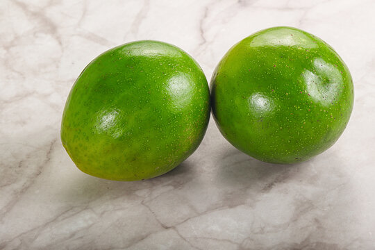 Two ripe green exotic avocado fruit