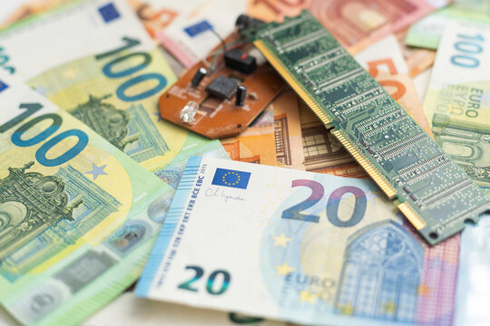 Close-up of EURO banknotes with microprocessors on top