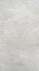 This image features a white textured wall with a soft focus, highlighting the gentle undulations and shadows. Velvety alcantara texture - obrazy, fototapety, plakaty