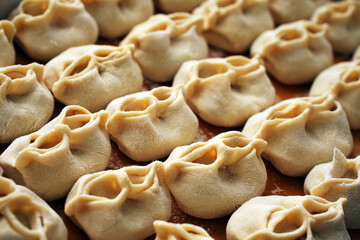 Traditional dumplings, asian food, manty or dim sum stuffed with meat - 777063925