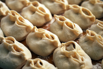 Traditional dumplings, asian food, manty or dim sum stuffed with meat - 777063961