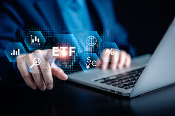 ETF Exchange traded fund stock market trading investment financial concept, Businessman touch icons of ETF virtual screen