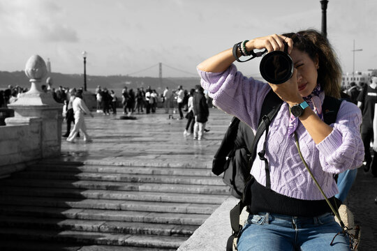 Girl taking photo with the camera