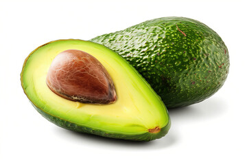 Half-cut ripe avocado with pit on white. Perfectly ripe avocado cut in half on white background