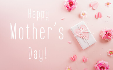 Happy Mother's day and Women's Day decoration concept made from flower and gift box on pastel background.