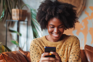 Portrait of a Smiling Young Black Woman Browsing Internet and Social Networks on Her Smartphone. Young Female Manager Checking Dating Apps, Shopping Online, Messaging Friends and Family