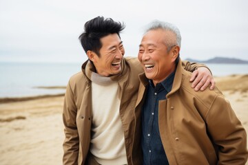 Senior father hugging son, have a happy feeling together. Happy active senior couple having fun outdoors. Generative AI.