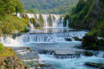Waterfalls of Una National Park in Bosnia and Herzegovina. A network of river streams, pools, water rapids, canyons and waterfalls.