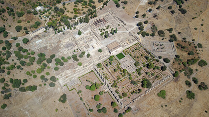 Aerial drone view of the Caliphate City of Medina Azahara in Cordoba. Archaeological site. Unesco World Heritage, Spain. Ancient civilization. Historic place. Touristic destination for holidays.