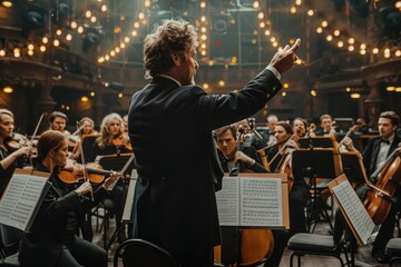 Audience And Conductor Enjoying Live Orchestra Performance In Theater