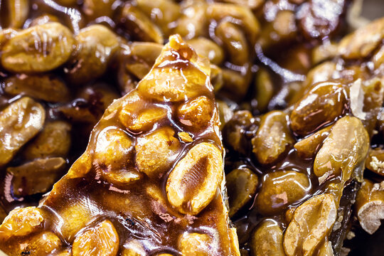 pé de moleque, a typical sweet of Brazilian cuisine, made from a mixture of roasted peanuts and rapadura. Festa Junina sweet, country lifestyle.