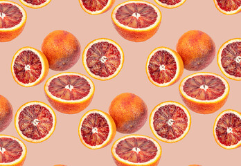 Many blood oranges, whole and halved pattern