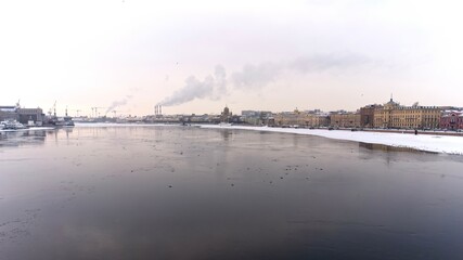 Fototapeta na wymiar St. Petersburg, Russia, February 10, 2024. View of the Neva River from the Blagoveshchensky Bridge.
