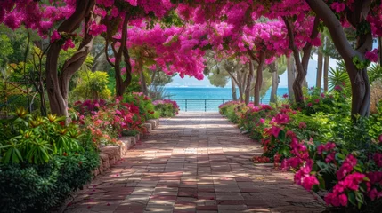  A walkway lined with pink flowers and trees by the ocean, AI © starush