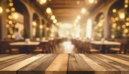 Gardinen empty wood table top on blur light gold bokeh of cafe restaurant in dark background © netsay