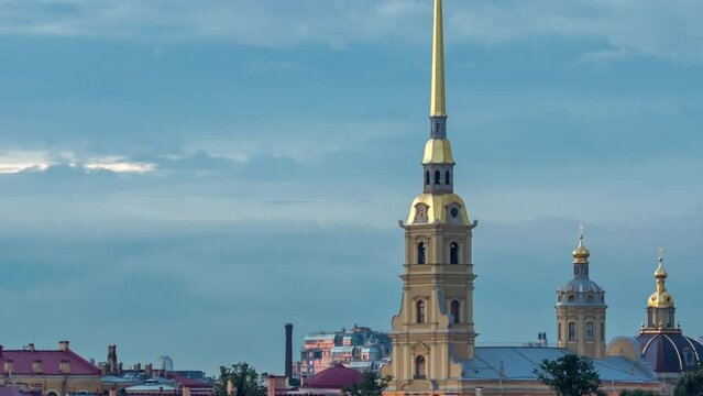 Peter and Paul Fortress after sunset, founded by Peter the Great in 1703, transitions from day to night in this timelapse. Located in St. Petersburg, Russia. Lights turning on
