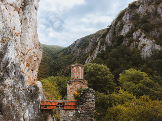 North Macedonia landmark - St. Nicholas old monastery in mountains of Matka canyon, travel in Balkans beautiful destination landscape - obrazy, fototapety, plakaty