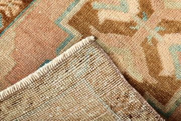 Textures and patterns in color from woven carpets