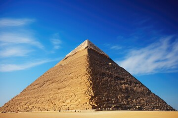 Fototapeta na wymiar The Great Pyramid against a clear blue sky.
