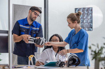 Innovative team including engineer, doctor and surgeon design robotic limbs for patient rehab.