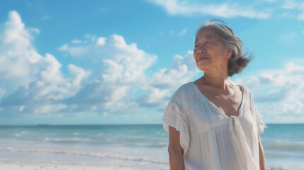 Beautiful mature woman at the beach