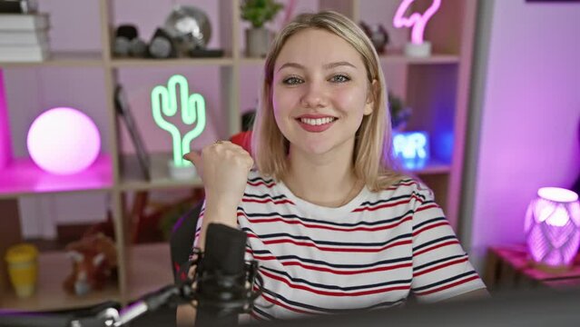 Blonde bombshell streamer owning the night, confident smile elucidating her gaming room. with a pointing hand and thumbs-up, she's the winning queen of her home office gaming fortress.