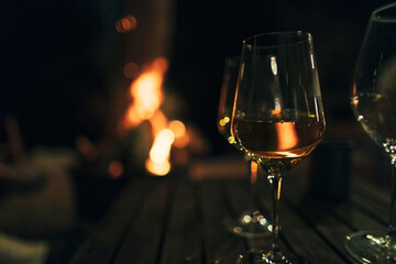 Glasses of wine on the fireplace