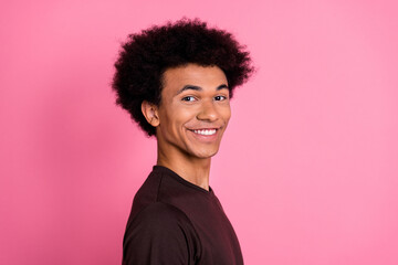 Portrait photo of handsome attractive young man posing with white teeth smiling optimist advertisement isolated on pink color background - obrazy, fototapety, plakaty