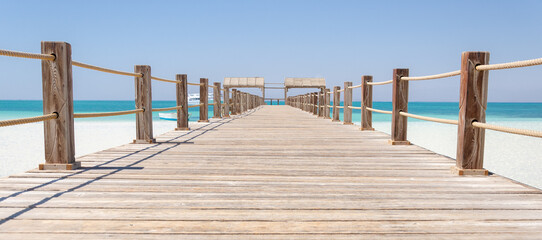 Wooden Pier at Orange Bay Beach coastline of Giftun island, Hurghada, Red Sea, Egypt. - 777272110