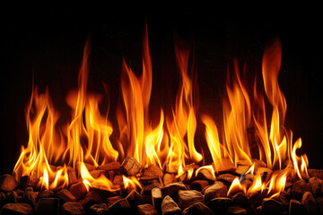 Intense Flames Rising From a Bonfire in a Nighttime Outdoor Setting