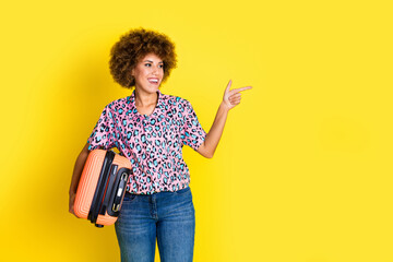 Photo of excited funky lady dressed leopard print shirt holding baggage looking showing empty space...