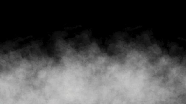 Realistic white smoke or fog overlay effect in Slow motion on black background. Abstract background of natural smoke misty fog or vapor in slowly moving on dark backdrop, 4k shot of Gray fog