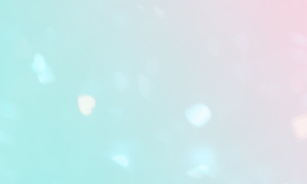 Luzes bokeh desfocadas luz iridescente sobre fundo colorido. Desfoques brilhantes. Verde claro laranja. Fundo de tela, prote&ccedil;&atilde;o de tela. Banner, site, apresenta&ccedil;&atilde;o. Tons past&eacute;is.  Brilho, iluminado.