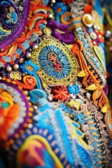 Detailed vibrant embroidery on textile close-up view