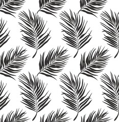 Elegant seamless pattern of black tropical palm leaves on a white background, ideal for fabrics, wallpapers and decorative designs.