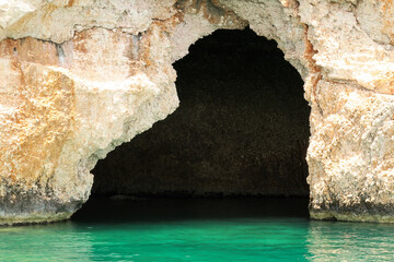 The famous Pirate Cave or Blue Cave on Asirli Island in the Gökkaya Bay close to Demre, Turkey