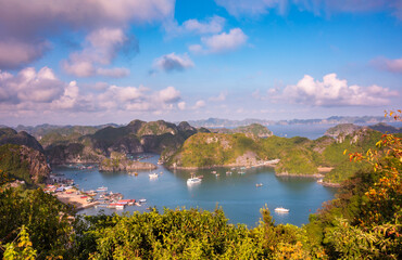 Sea landscape in Vietnam with many small islands and boats. View from above