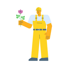 Builder holding flower and smiling